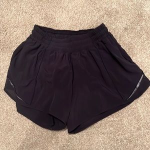 Lululemon hotty hot low rise navy shorts size 4 tall, 4 long
